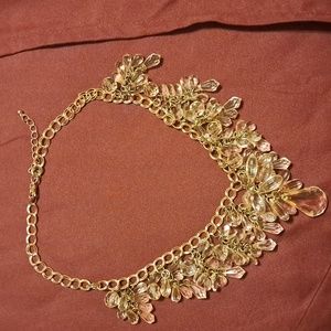 Goldtone and crystal necklace